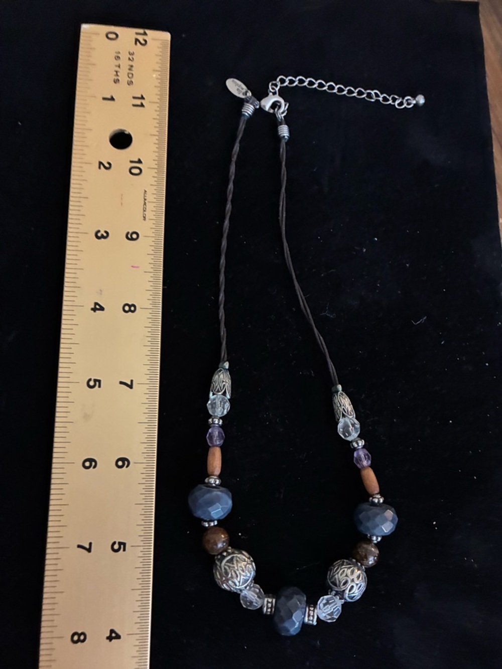 Lia Sophia EUC Necklace Blue
Sodalite Stone Wood Bead
Leather Cord Silver Tone - Picture 11 of 12